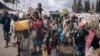 FILE - War-displaced people flee towards the city of Goma, eastern Republic of Congo, Nov. 15, 2022. 