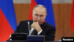 FILE -Rais wa Russia Vladimir Putin (Valeriy Sharifulin/TASS Host Photo Agency/Handout via Reuters)