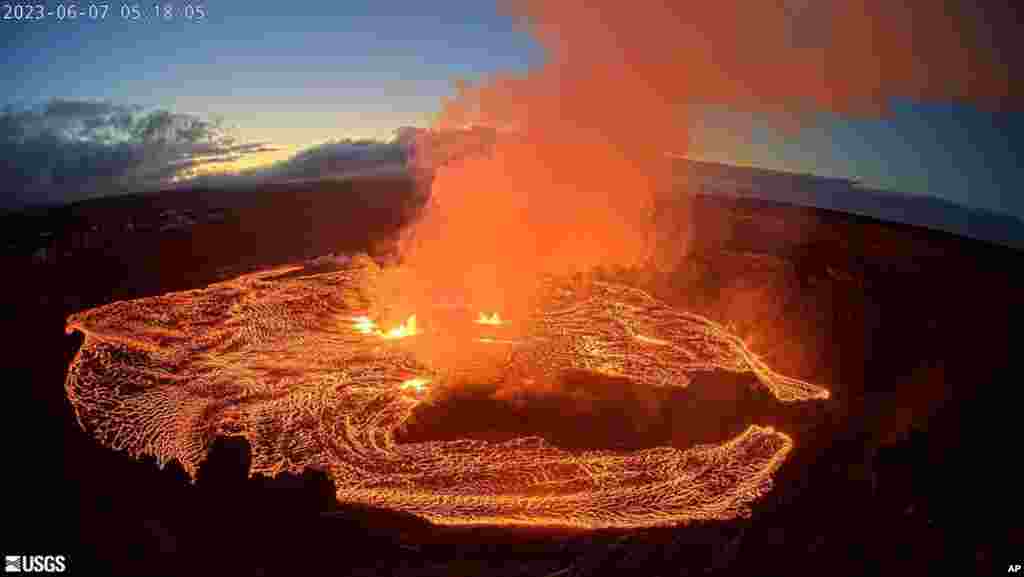 In this webcam image provided by the U.S. Geological Survey, an eruption takes place on the summit of the Kilauea volcano in Hawaii.