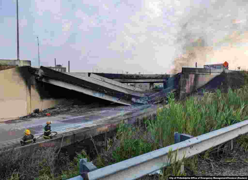 A general view shows the partial collapse of Interstate 95 after a fire underneath an overpass in Philadelphia, Pennsylvania. A portion of a major U.S. highway collapsed in Philadelphia after a vehicle caught fire underneath it, city officials said. No injuries were reported.