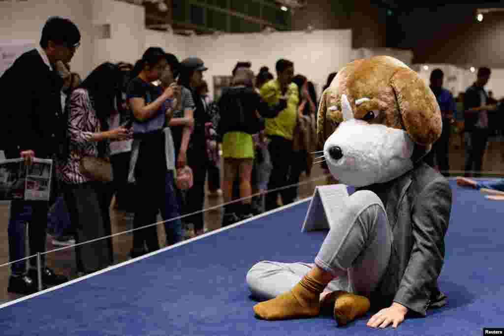Performing arts titled “Solitude of Silences” by Gimhongsok is staged at Art Basel in Hong Kong, China.