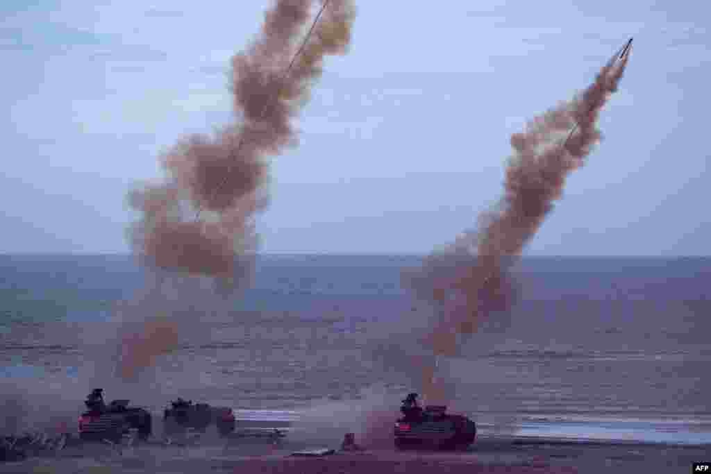 Taiwan military soldiers fire the ML154 Mine Clearance Launcher during the annual Han Guang anti-landing drill at Bali beach, New Taipei City.