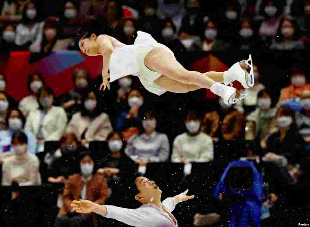 Japan's Riku Miura and Ryuichi Kihara perform during the pairs free skating event of the World Figure Skating Championships in the Saitama Super Arena, Saitama, Japan.