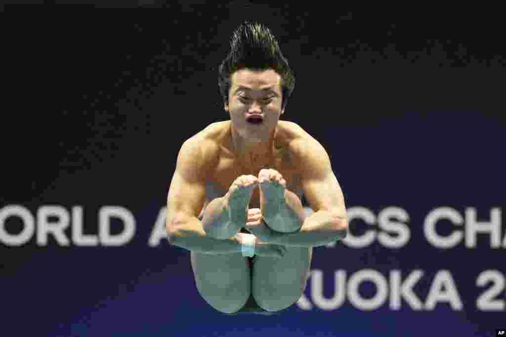 Woo Haram of South Korea competes during the men's 1m springboard diving competition at the World Swimming Championships in Fukuoka, Japan.