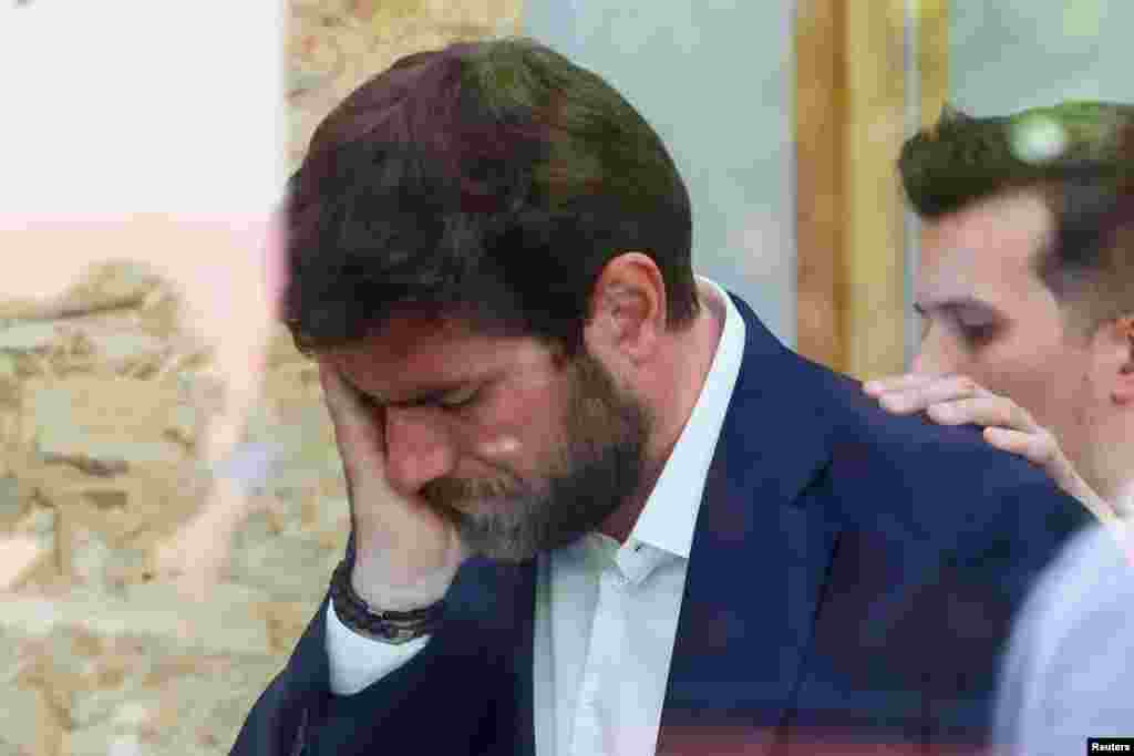 L'Hay-les-Roses mayor Vincent Jeanbrun reacts at the city hall in L'Hay-les-Roses, where his home was ram-raided and set alight, while his wife and children were asleep inside, during the unrest, following the death of Nahel, a 17-year-old teenager killed by a French police officer in Nanterre during a traffic stop, in L'Hay-les-Roses near Paris, France.