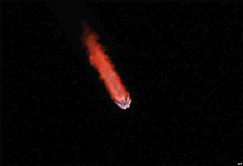 A SpaceX Falcon 9 rocket soars into orbit from the Kennedy Space Center on the Intuitive Machines' Nova-C moon lander mission, in Cape Canaveral, Florida.