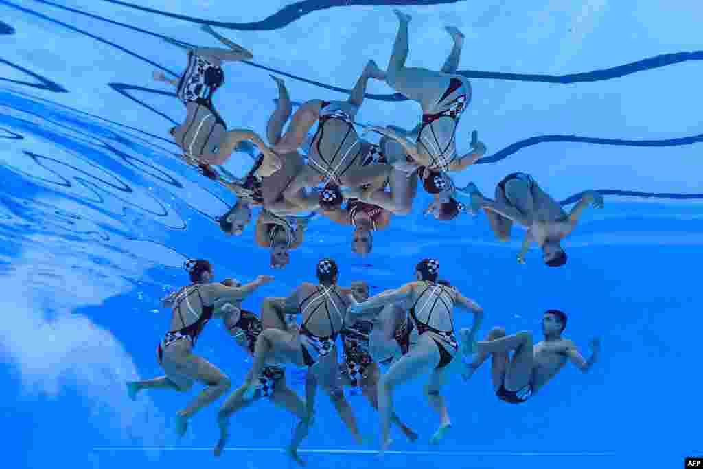 Team Chile competes in the final of the acrobatic routine artistic swimming event during the 2024 World Aquatics Championships at Aspire Dome in Doha, Qatar.