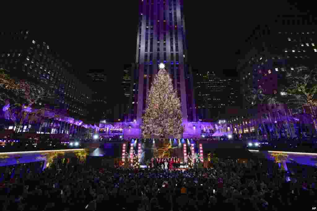 The Christmas tree at Rockefeller Center is lit in New York, Nov. 29, 2023.