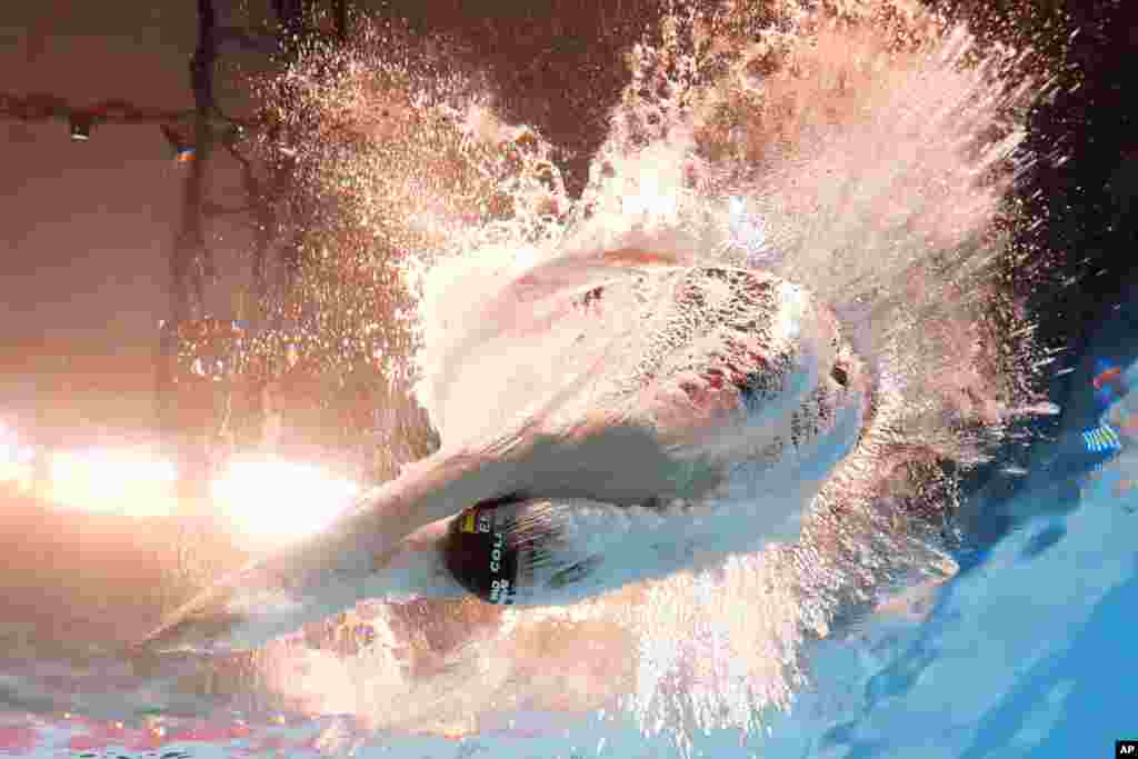 Carles Coll Marti of Spain competes in the men's 200-meter breaststroke heat at the World Aquatics Championships in Doha, Qatar.