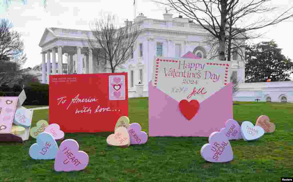 Valentine’s Day decorations adorn the lawn at the White House in Washington.