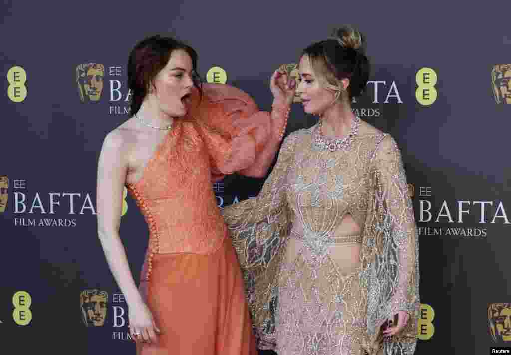 Emma Stone and Emily Blunt arrive at the 2024 British Academy of Film and Television Awards (BAFTA) at the Royal Festival Hall in the Southbank Centre, London.