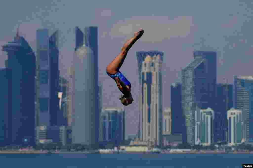 Australia's Rhiannan Iffland competes in the women's 20m round high diving event during the World Aquatics Championships in Doha, Qatar.