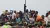 Thousands of Nigeriens gather in front of the French army headquarters in support of the putschist soldiers and to demand the French army to leave, in Niamey, Niger, Sept. 2, 2023.