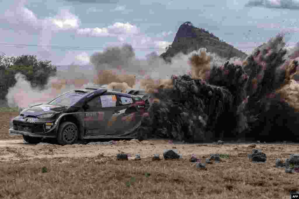 Toyota Gazoo Racing WRT's Japanese driver Takamoto Katsuta steers his Toyota GR Yaris Rally1 Hybrid with Irish co-driver Aaron Johnston during the World Rally Championship (WRC) Safari Rally Kenya Special Stage 13 (SS13) in Gilgil, March 30, 2024. 