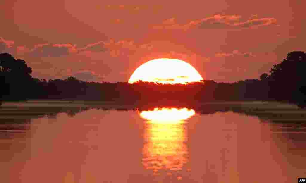 The sun rises along the Turning Basin at NASA's Kennedy Space Center in Cape Canaveral, Florida.