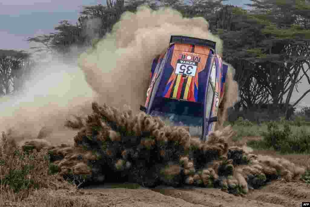 Tanzanian driver Yasin Nasser loses control of his Ford Fiesta Mk II with Ugandan co-driver Ali Katumba during the World Rally Championship (WRC) Safari Rally Kenya Special Stage 7 (SS7) in Naivasha.
