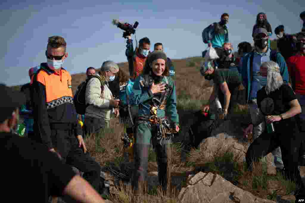 Spanish athlete Beatriz Flamini reacts upon getting out of a cave in Los Gauchos, near Motril, spending 500 days in insolation inside.
