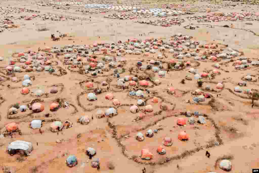 This aerial view shows makeshift structures of people displaced by drought at the Ladan internally displaced people (IDP) camp in Dolow, Somalia, May 1, 2023.