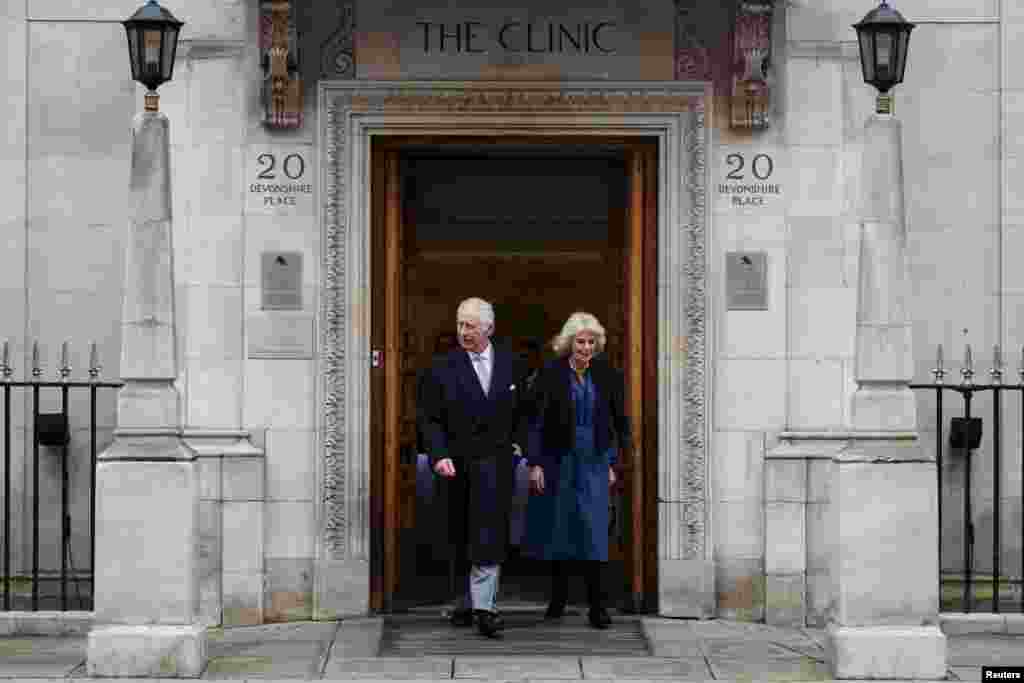 Britain's King Charles leaves the London Clinic with Queen Camilla after receiving treatment for an enlarged prostate in London.