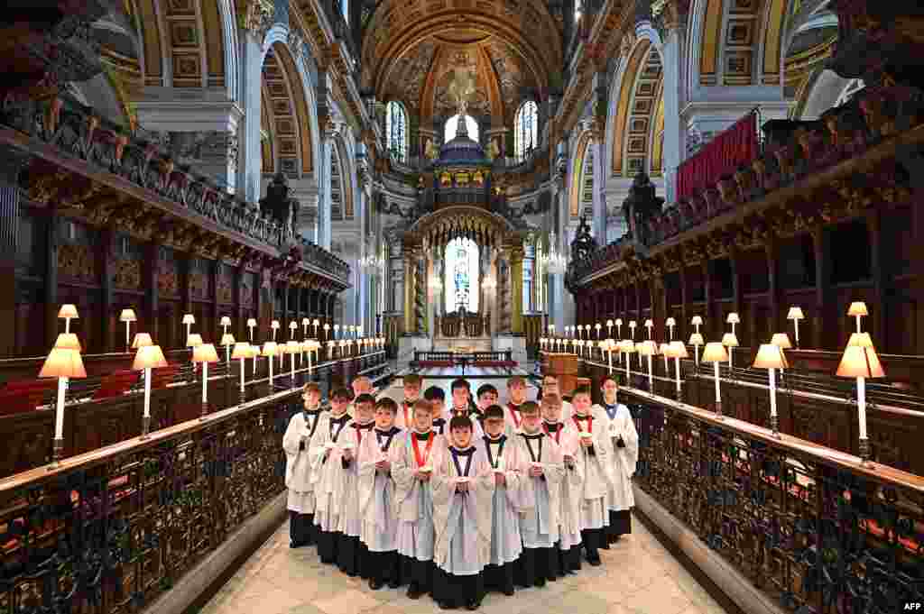 Choristers take part in a rehearsal for their upcoming Christmas performances, at St. Paul's Cathedral in central London.