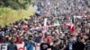Jelang Kunjungan Blinken, Rombongan Migran dari Amerika Tengah Bergerak ke AS Melalui Meksiko
