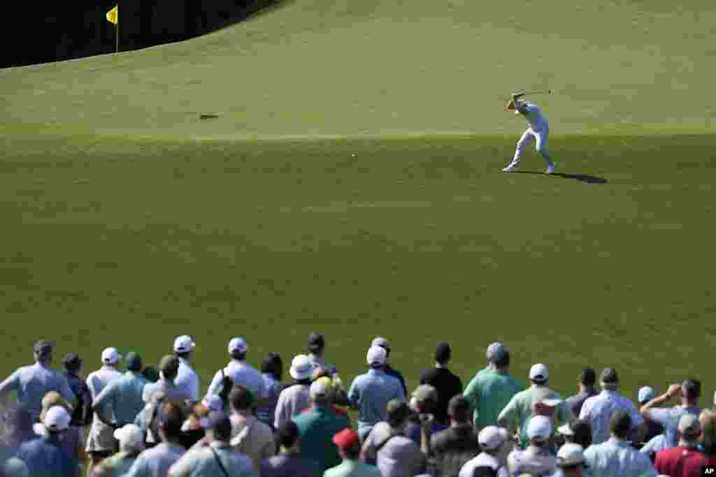 Tyrrell Hatton of England reacts on the 11th hole during a practice round in preparation for the Masters golf tournament at Augusta National Golf Club in Georgia.