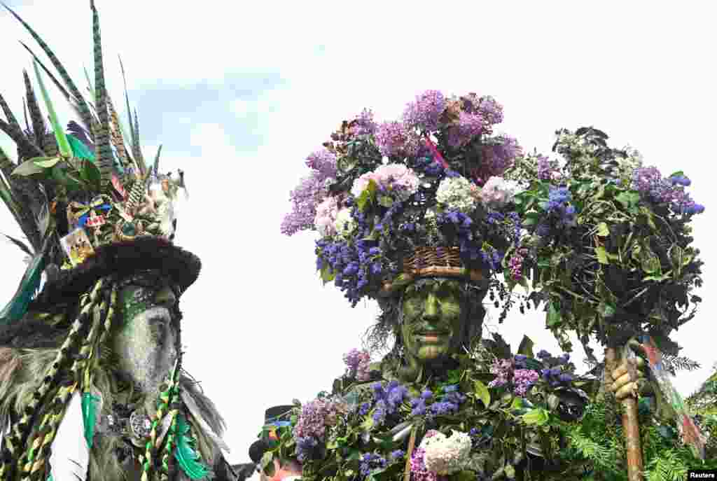 Participants attend the annual May Day bank holiday "Jack In The Green" parade and festival in Hastings, Britain.