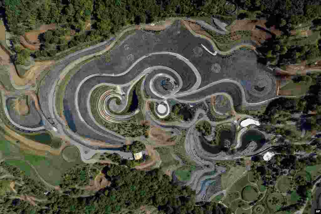 This photo taken by a drone shows an aerial view of a nature park shaped after Vincent van Gogh's painting "The Starry Night" near Visoko, Bosnia.