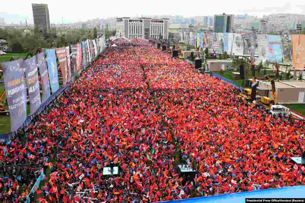 Supporters of Turkish President Tayyip Erdogan take part in a rally ahead of the May 14 presidential and parliamentary elections, in Ankara.