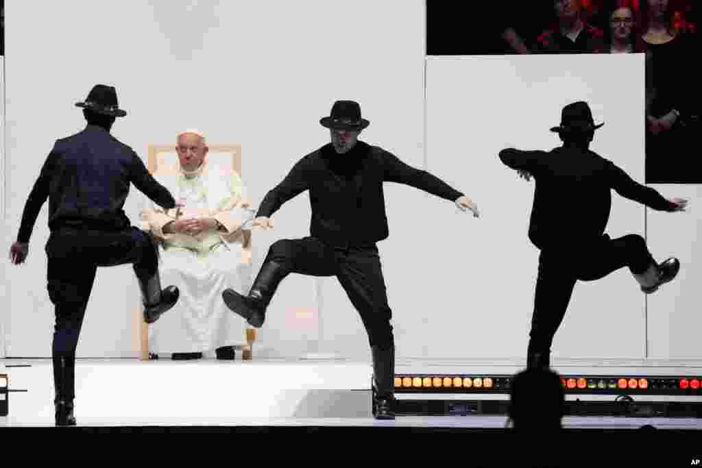Pope Francis watch dancers during a meeting with young people at the Laszlo Papp Budapest Sports Arena, in Budapest, Hungary, April 29, 2023.