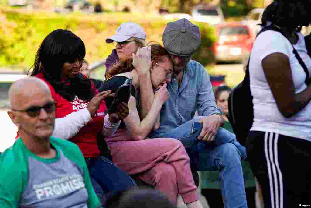 Community members attend a vigil at Crescent Hill Presbyterian Church following a mass shooting at Old National Bank in downtown Louisville, Kentucky, April, 10, 2023.