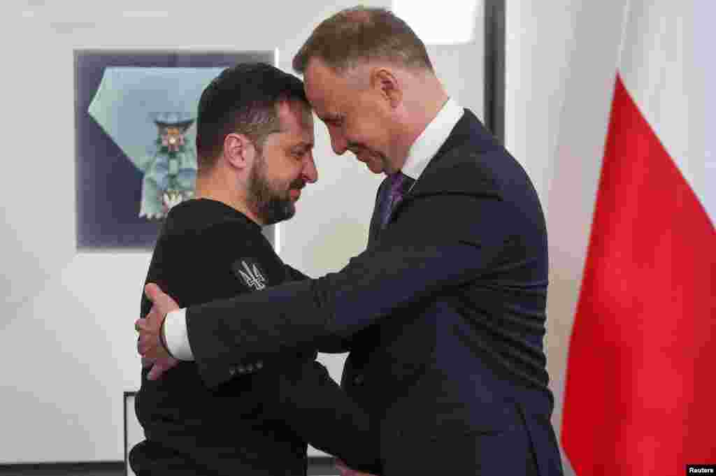 Poland's President Andrzej Duda greets Ukrainian President Volodymyr Zelenskyy at the Presidential Palace in Warsaw, Poland.