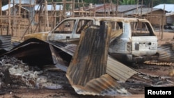 Supostos rebeldes islamistas das Forças Democráticas Aliadas (ADF), atacam as aldeias de Masala, no leste da República Democrática do Congo, a 9 de junho de 2024.