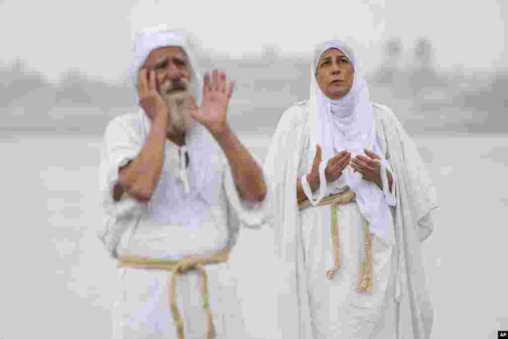 Followers of the Sabean Mandaeans faith perform their rituals in the Tigris River during a celebration marking "Banja" or Creation Feast, in central Baghdad, Iraq.