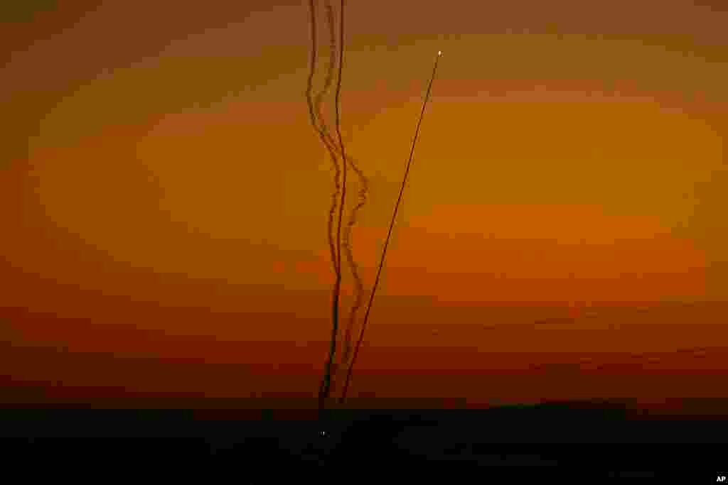 Rockets are fired toward Israel from the Gaza Strip, as seen from southern Israel.