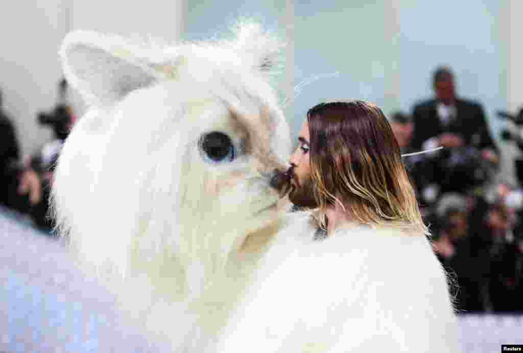 Jared Leto, dressed as Karl Lagerfeld's cat Choupette, poses at the Met Gala, an annual fundraising gala held for the benefit of the Metropolitan Museum of Art's Costume Institute with this year's theme "Karl Lagerfeld: A Line of Beauty", in New York City, May 1, 2023. 