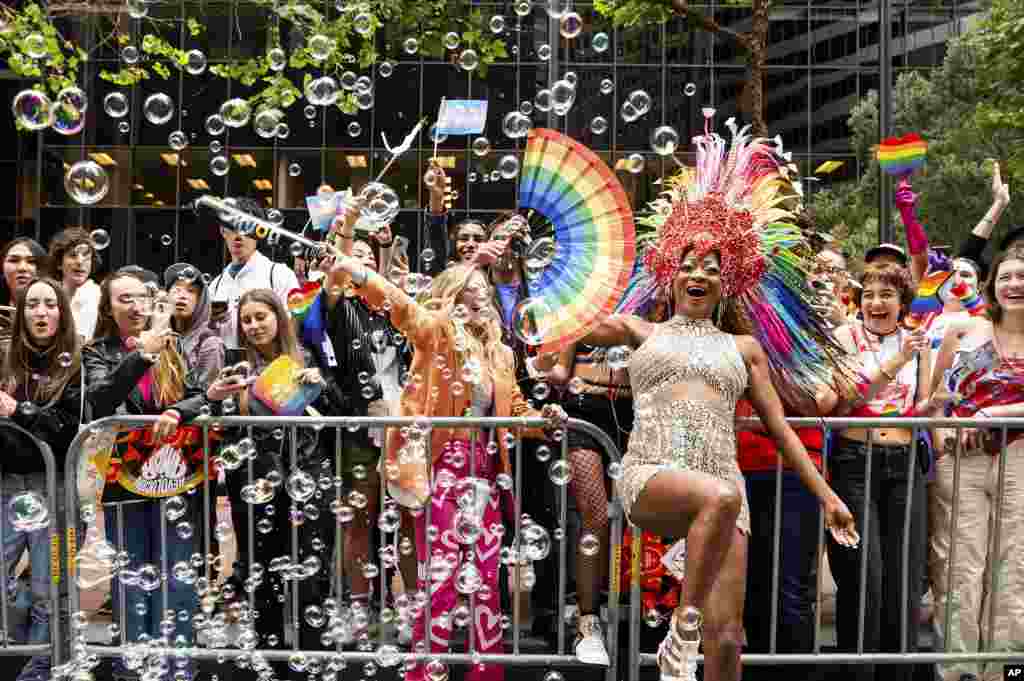 Revelers celebrate during San Francisco's Pride Parade, June 25, 2023.