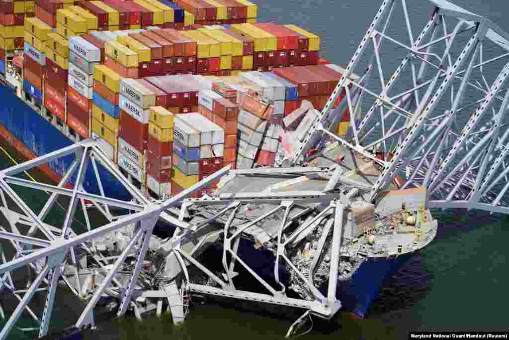 Aerial view of the Dali cargo vessel which crashed into the Francis Scott Key Bridge, causing it to collapse in Baltimore, Maryland, March 26, 2024.