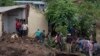 Malawi defense force soldiers work with community members to recover bodies of victims of landslides after heavy rains from Cyclone Freddy in Blantyre, Malawi, March 16, 2023. 