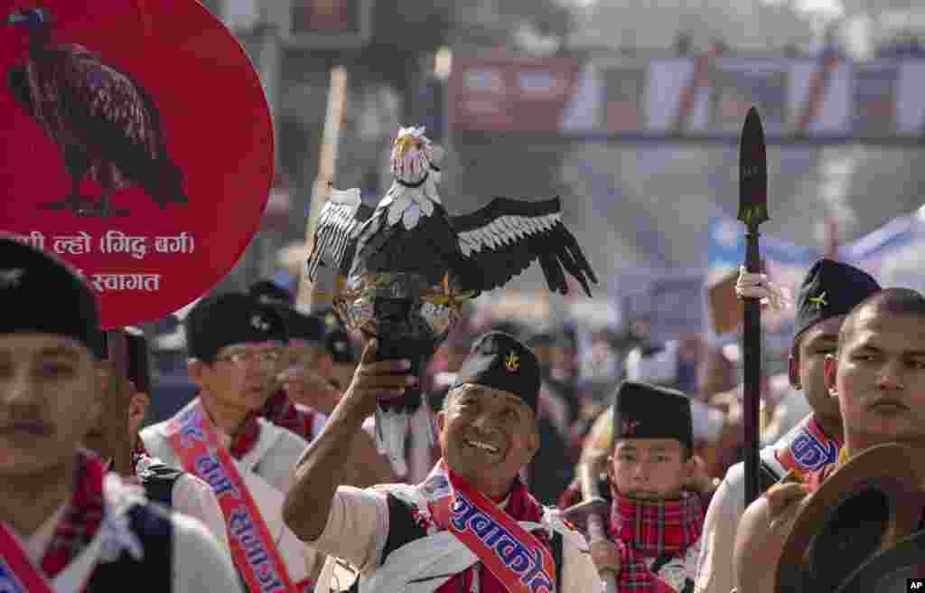 Gurung community men in traditional attire participate in a parade to mark their New Year known as "Tamu Loshar" in Kathmandu, Nepal, Dec. 31, 2023.