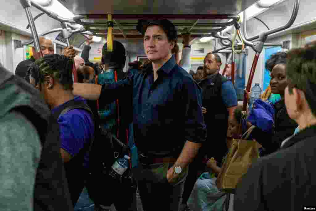 Canada's Prime Minister Justin Trudeau rides the subway during the TTC's annual Emancipation Day Underground Freedom Train Ride in Toronto, Ontario, July 31, 2023.