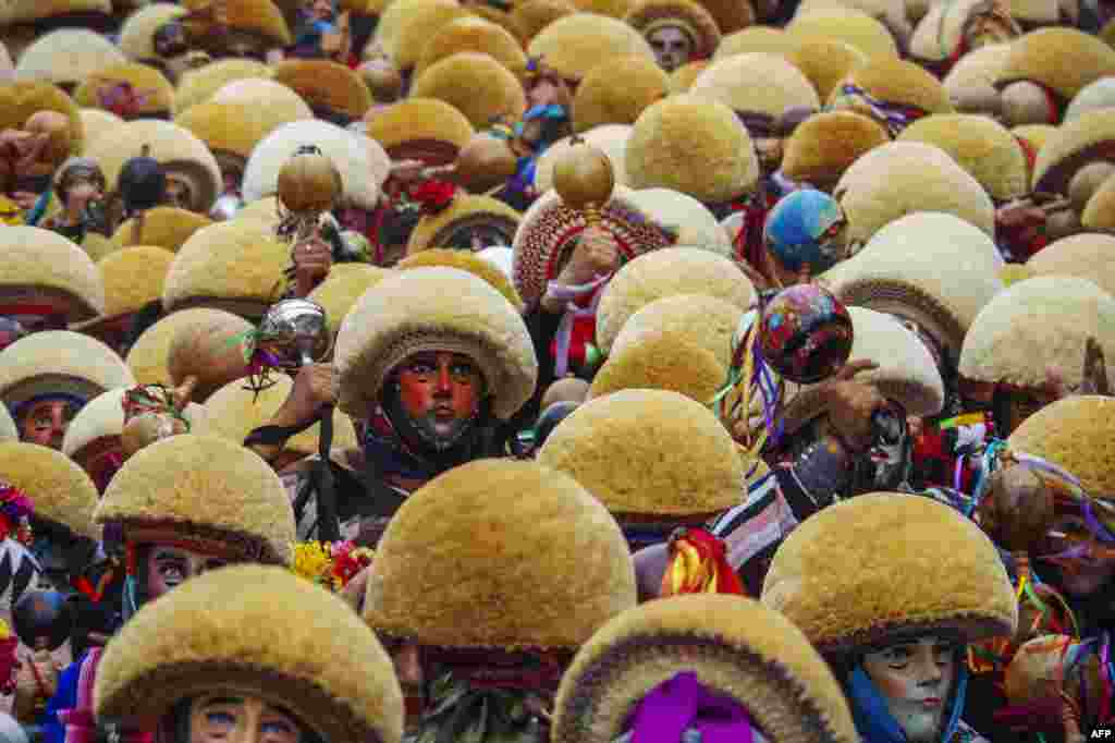 Dancers perform during the celebration of the "Parachicos" traditional festivity in Chiapa de Corzo, Chiapas State, Mexico, Jan. 17, 2024.