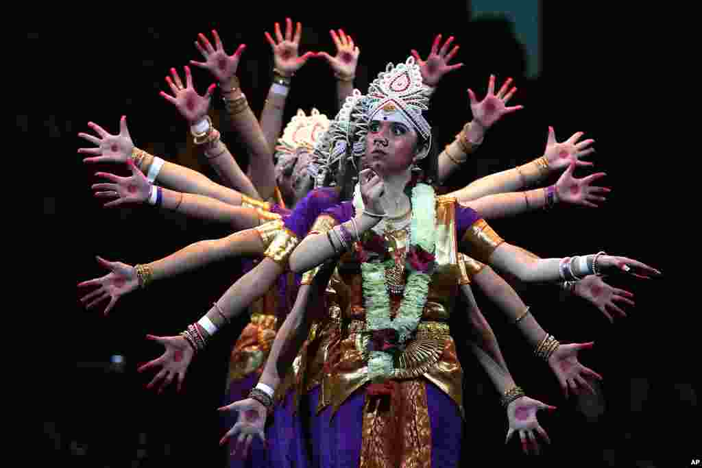 Dancers perform ahead of Indian Prime Minister Narendra Modi's arrival to attend an Indian community event at Qudos Bank Arena in Sydney, Australia.