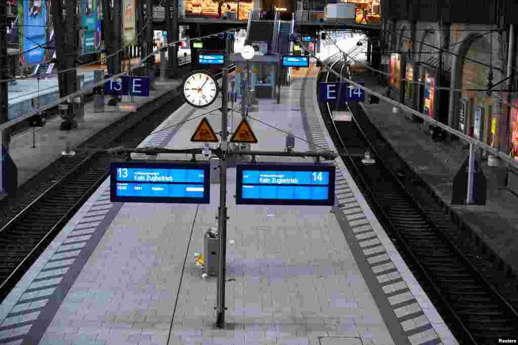 An electronic display reading 'no traffic of trains due to the strike' is seen at the main railway station during a nationwide strike called by the German trade union Verdi over a wage dispute in Hamburg.