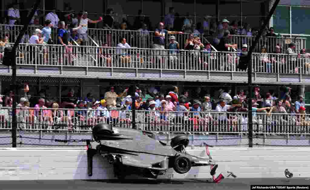 Andretti Autosport driver Kyle Kirkwood (27) slides across the SAFER barrier through the second turn after a crash with Arrow McLaren SP driver Felix Rosenqvist (not pictured) during the 107th running of the Indianapolis 500 at Indianapolis Motor Speedway. (Credit: Jef Richards-USA TODAY Sports)