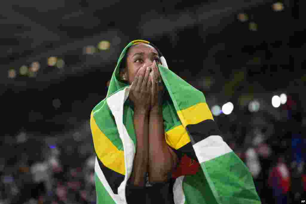 Thea Lafond of Dominica reacts after winning the gold medal in the women's triple jump during the World Athletics Indoor Championships at the Emirates Arena in Glasgow, Scotland.