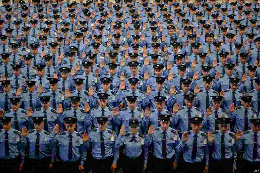 New members of Kosovo Police force are sworn-in during the graduation ceremony of the 58th generation of the Kosovo Police, in Pristina.