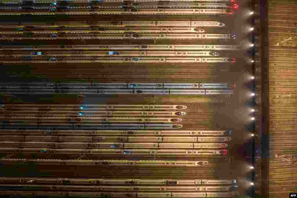 This aerial photo shows bullet trains parked at Nanjing south railway station in Nanjing, in eastern China's Jiangsu province.