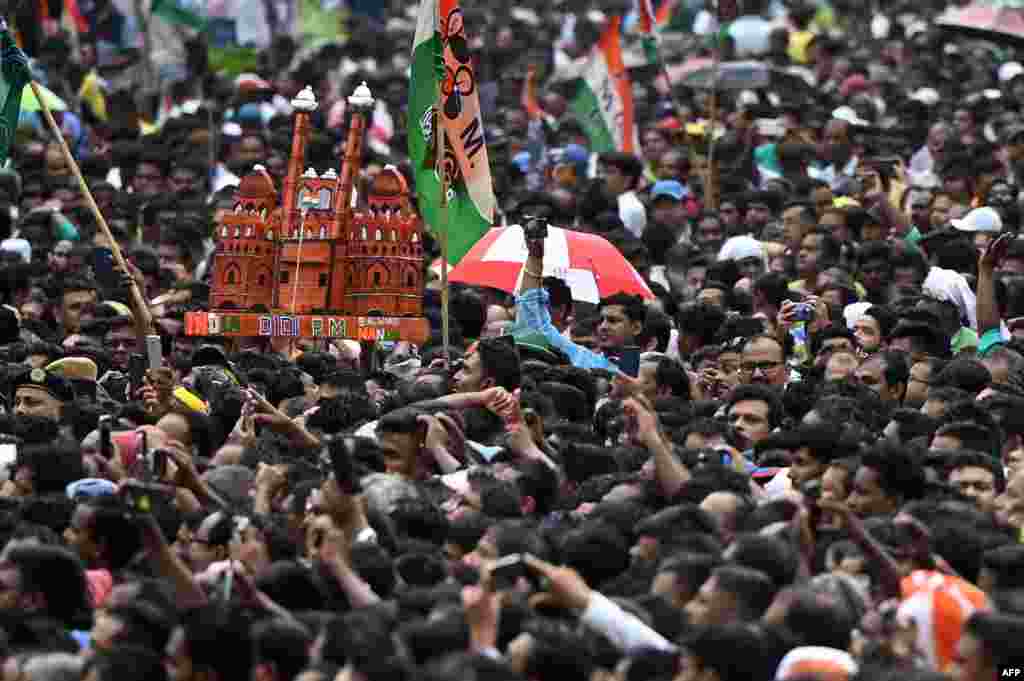 Supporters of the Trinamool Congress (TMC) party attend a rally to mark the annual Martyrs Day in Kolkata.
