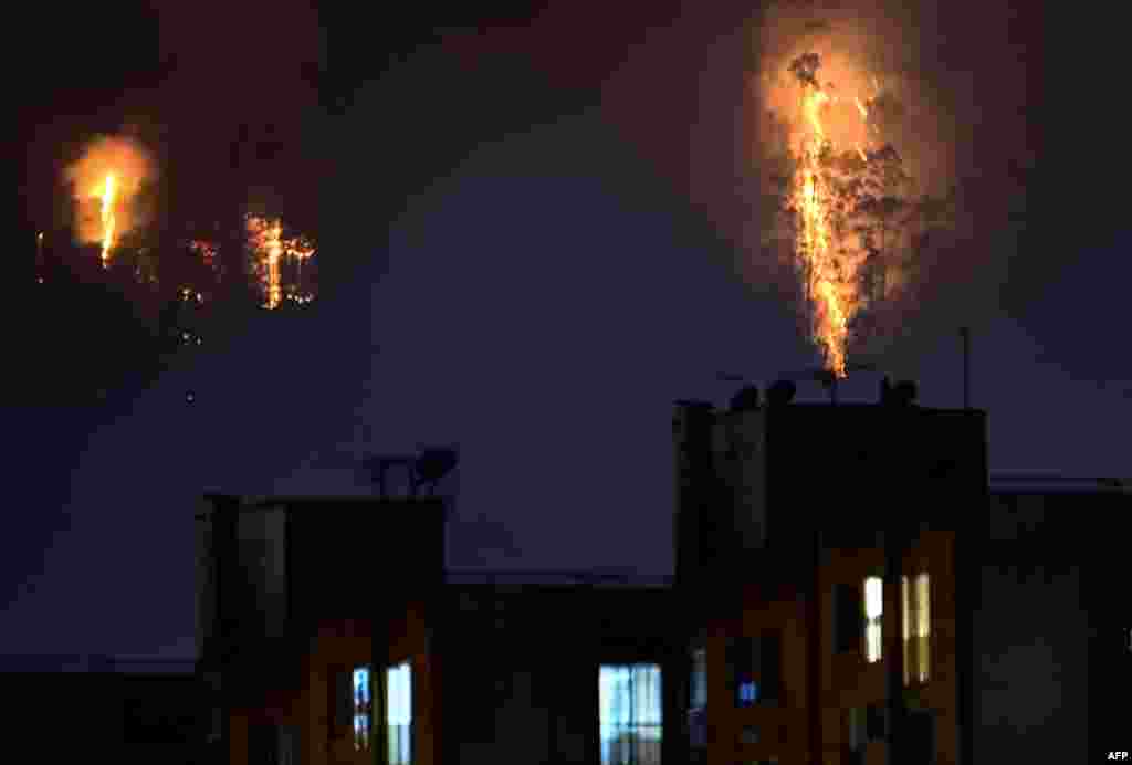 Flames rise from a forest during a wildfire in Bogota, Jan. 24, 2024. More than twenty forest fires have Bogota and several regions of Colombia on alert amid record temperatures due to the El Niño phenomenon, according to an official report. 